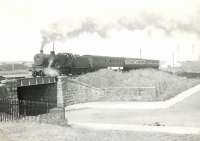 2P 4-4-0 no 40663 takes the midday passenger train over Kessock Road, Fraserburgh, in the summer of 1954 [see image 19557].<br><br>[G H Robin collection by courtesy of the Mitchell Library, Glasgow 07/08/1954]