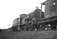 Fowler 4F 0-6-0 44193 approaching Giffnock from the Clarkston direction on 13 September 1960 running tender first with the afternoon goods.<br><br>[David Stewart 13/09/1960]