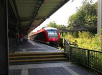 A class 648 DMU with the 15.34 service to Lubeck awaits its departure time at Travemunde on 13 August 2014. <br><br>[Bruce McCartney 13/08/2014]