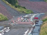 Double track meets single track - the new junction section to the south of Tynehead, in position on 16 August 2014. <br><br>[John Furnevel 16/08/2014]