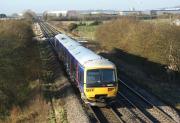 A First Great Western service to Bedwyn, formed by 3 car Turbo Express unit 166208, approaches Thatcham, between Reading and Newbury, on 6 December 2008.<br><br>[John McIntyre 06/12/2008]