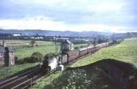 Shrouded in steam, Black 5 45061 passes Busby Junction on 24 May 1965 with a train from Dumfries heading for St Enoch.<br><br>[John Robin 24/05/1965]