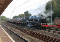 <I>Fun and games at Lancaster</I>. Black 5 45231 with the <I>Fellsman</I> stock stands on the Up Fast line at Lancaster having been wrongly routed there by Preston PSB instead of into Platform 4 where around a hundred passengers were waiting. Fortunately, the Class 37 on the rear was allowed to set back with the train so the service got away to Preston without too much delay. <br><br>[Mark Bartlett 20/08/2014]