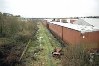 Site of the former Sandyford Halt station looking towards Paisley Abercorn in 1998. The station had timber platforms and sidings serving the works on the right.<br><br>[Ewan Crawford //1998]