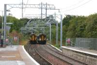 156510 passes 156456 outside a partially wired Kirkwood station on 21st August 2014. <br><br>[Colin McDonald 21/08/2014]