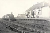 Ex-GER F4 2-4-2T no 67164, built at Stratford Works in 1907, brings the branch train from Fraserburgh into St Combs in the summer of 1951, a month before its withdrawal. Note the cowcatchers which were fitted to locomotives operating over the sparsely fenced branch. <br><br>[G H Robin collection by courtesy of the Mitchell Library, Glasgow /07/1951]