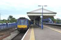 Class 121 55020/121020 draws admiring glances from a young observer in a prime position as it waits in the bay platform at Princes Risborough.<br><br>[Malcolm Chattwood 16/08/2014]