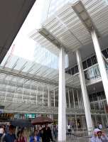 London Bridge station forecourt, dominated by The Shard, on a wet 25 July 2014.<br><br>[Bill Roberton 25/07/2014]