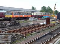 A preserved hybrid class 303 in the yard at Bo'ness on 25 August 2014. [See image 10753] <br><br>[Bill Roberton 25/08/2014]