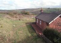 Remains of the former station at Brinkburn on the Northumberland Central Railway in early 1998. View is north towards the terminus at Rothbury. Closed to passengers in 1952, with the line itself closing in 1963, the refurbished former station master's house is now used as self-catering holiday accommodation. <br><br>[Ewan Crawford //1998]