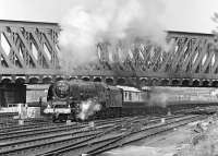 Not my preferred spot for photographing 46229 <I>Duchess of Hamilton</I> leaving York with the second 'Limited Edition' trip round the Harrogate circuit on 10 May 1980, but having been evicted with other photographers by the BTP from the west side of the line at Holgate Junction, it was the best available at short notice.<br><br>[Bill Jamieson 10/05/1980]