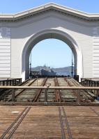 Pier 43 and its Headhouse in the Port of San Francisco. Built in 1914 by the Belt Railroad for loading train-ferries. Through the arch is the Liberty ship, <I>SS Jeremiah O' Brien</I>, moored at Pier 45. Launched in WW11, still very much seaworthy and powered by reciprocating triple expansion steam engines.<br><br>[Brian Taylor 20/04/2014]