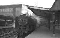 The 1S91 Crewe - Glasgow Central relief service about to leave Carlisle platform 3 on 7 April 1966 behind Kingmoor's Britannia Pacific no 70002 <I>Geoffrey Chaucer</I>.<br><br>[K A Gray 07/04/1966]