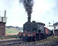 Wemyss Private Railway No. 19 (Andrew Barclay No. 2067/1939) passes Methil West box with a rake of mineral wagons from the BR exchange sidings on 22 August 1969.<br><br>[Bill Jamieson 22/08/1969]