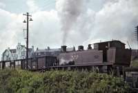 Wemyss Private Railway No. 17 (Andrew Barclay No. 2017/1935) banking a rake of mineral wagons from the BR exchange sidings near Methil West box on 22 August 1969. No. 19 was at the head of the train. [See image 48535]<br><br>[Bill Jamieson 22/08/1969]