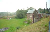 The former station at Almondbank looking south west from the road bridge in 1995. [See image 40355]<br><br>[Ewan Crawford //1995]