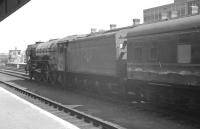 The 7.51am Holloway sidings - Edinburgh Waverley <I>Anglo Scottish Car Carrier</I> runs north through Doncaster on 31 May 1963 behind A1 Pacific 60157 <I>Great Eastern</I>. Three years later the service would become part of the revamped and rebranded BR <I>Motorail</I> network. [See image 27437]<br><br>[K A Gray 31/05/1963]