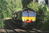 A Nairn - Millerhill freight passes though the site of the original Bridge of Allan station on the morning of 1 September 2014.<br><br>[Colin McDonald 01/09/2014]