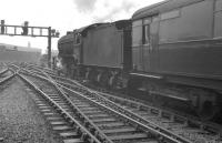 Hull Dairycoates based K3 2-6-0 no 61935 takes a train away from the west end of Newcastle Central in July 1961. The train in question is the summer Saturday 9.20am Glasgow Queen Street - Scarborough.<br><br>[K A Gray 22/07/1961]