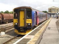 First Great Western single unit 153372 stands in platform 2 at Swindon on 29 August after arrival with the 11.47 ex Westbury. This train is routed via the single track section between Trowbridge and Chippenham to serve Melksham, where a good number of local and longer distance travellers make use of the service.<br><br>[David Pesterfield 29/08/2014]