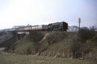 70035 <I>Rudyard Kipling</I> takes a parcels train north over Kennishead Viaduct on 31 March 1965. <br><br>[John Robin 31/03/1965]