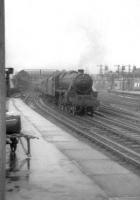 An unidentified Black 5 bringing a train into Glasgow Central on a wet and overcast July day in 1960. The train is entering the station off the old bridge.<br><br>[David Stewart 26/07/1960]