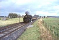 Standard class 5 no 73060 approaching Lamington distant signal on 26 September 1964 with a Glasgow Central - Manchester Victoria relief service. <br><br>[John Robin 26/09/1964]