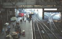 Looking north through Perth station on 5 June 1982 on the occasion of the Angus Railway Group <I>'Forfar Farewell'</I> railtour. EE Type 4 no 40143 stands in the background with the second of two round trips between Perth and Forfar [see image 27566].<br><br>[Bruce McCartney 05/06/1982]