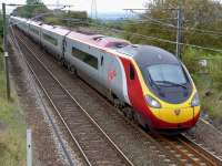 The 08.43 Euston - Edinburgh Pendolino passes the former Camps Junction on 9 September.<br><br>[Bill Roberton 09/09/2014]