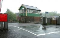 A grey, wet afternoon at Great Corby level crossing on the Newcastle and Carlisle line on 12 May 2006.<br><br>[John Furnevel 12/05/2006]