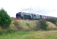The SRPS <I>Forth Circle</I> special runs through Winchburgh on 14 September approaching the bridge over the B8020. Stanier Pacific 46233 <I>Duchess of Sutherland</I> is in charge.<br><br>[Jim Peebles 14/09/2014]