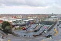 Elevated view of Blackpool North from the new municipal buildings that now overlook the station. A 150 Sprinter is in Platform 2, while a 158 waits in Platform 6 on a York service. The taxi rank and land beyond were once occupied by the main station platforms which extended back beyond the area now covered by the road.<br><br>[Mark Bartlett 15/09/2014]