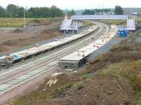 Looking south over Shawfair Station on 16 September with work on the footbridge well advanced.<br><br>[Bill Roberton 16/09/2014]