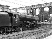 Rather unusually, the loco off <I>The Fellsman</I> of 23 July 2014 took water from a tanker near the signal box at Carlisle and then made a quick sortie to Currock and London Road Junctions to turn, rather than spending about an hour out at Upperby. Here 48151 is on one of the centre roads waiting to attach to the ecs which was parked on the west side of the station.<br><br>[Bill Jamieson 23/07/2014]