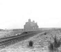 The 1861 station at Esslemont in May 1959 looking north towards Ellon. The station closed to passengers in 1952. [Ref query 9807]<br><br>[G H Robin collection by courtesy of the Mitchell Library, Glasgow 15/05/1959]