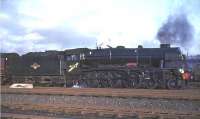 Royal Scot 46160 <I>Queen Victoria's Rifleman</I> standing alongside Kingmoor shed in November 1964 with the Warwickshire Railway Society's <I>Carlisle Tour</I>, which had originated from Birmingham New Street.<br><br>[John Robin 28/11/1964]