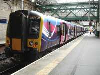 TransPennine Express 350409 At Waverley platform 11 on 14 July awaiting departure time with the 18.13 west coast service to Manchester Airport, routed via Wigan North Western and the curve onto the now electrified section between Earlestown and Manchester.<br><br>[David Pesterfield 14/07/2014]