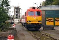 DBS 60024 has recently received the nameplates <I>Clitheroe Castle</I> from 60029. On 20 September 2014 the locomotive was displayed at the Hanson Cement Works in Clitheroe during a works open day. There are six trains a week from the works heading to Avonmouth or Mossend operated by DBS, normally by a Class 66 locomotive - so the naming and display of a Class 60 made an interesting change.<br><br>[John McIntyre 20/09/2014]