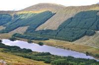 Black fives 45407 and 44871 top and tail <I>The West Highlander</I> past Lochan na Bi near Tyndrum on the way back to Crianlarich from Oban on 23 September. View from Sron nan Colan.<br><br>[John Gray 23/09/2014]