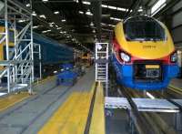 Looking West through the maintenance shed at Etches Park depot on its Open Day. Meridian set 222015 on the right certainly looks more modern than 50044, to the left.<br><br>[Ken Strachan 13/09/2014]