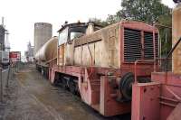 One of two 0-6-0 diesel shunters used at the Hanson Cement works near Clitheroe on 20 September 2014. The works formerly was known as Castle Cement is connected to the Blackburn to Hellifield line at Horrocksford Jct. The connection sees 6 arrivals and 6 departures each week using either 4 wheel or bogie tank wagons. [See image 42683]<br><br>[John McIntyre 20/09/2014]