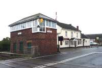 Bedlington South box on 24 September 2014, with <I>The Railway</I> pub standing just beyond the level crossing. Bedlington Station is on the north side of the crossing just off picture to the right. [See image 22454]<br><br>[John Steven 24/09/2014]