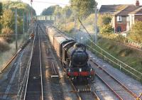 Almost the end of the tour on the fourth and final day of <I>The West Highlander</I>, as 61994 <I>The Great Marquess</I> brings the train past Oxheys Loop about 2 miles north of Preston station on 22 September 2014. This part of the tour had taken the less direct route from Glasgow by travelling via Paisley, Ayr and Dumfries.<br><br>[John McIntyre 22/09/2014]