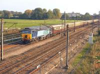 The <I>Northern Belle</I> railtour on the second circuit of a tour from Manchester via Bolton, Preston and Crewe passing Farington Junction on 21 September 2014. The leading locomotive is 57302 with 47790 on the rear.<br><br>[John McIntyre 21/09/2014]