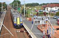 380012 enters Barassie on 29 September with a Glasgow Central - Ayr stopper.<br><br>[Bill Roberton 29/09/2014]