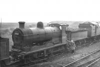 Pickersgill 3F 0-6-0 no 57650 awaiting disposal in the sidings at Hurlford in April 1962. Withdrawn from 67B the previous November, the locomotive was cut up at Connels of Coatbridge in May 1963.<br><br>[David Stewart 17/04/1962]