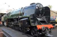 Gleaming BR Standard Class 9F 2-10-0 no 92214 stands in Loughborough shed yard on 2 October 2014. <br><br>[Peter Todd 02/10/2014]