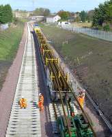 Tracklaying south of Shawfair station on 7 October 2014 with GBRf 66736 at the rear of the train.<br><br>[Bill Roberton 07/10/2014]