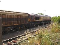 A failed 66115 stands in the stabling sidings alongside Bristol Parkway on 15 July 2013 awaiting the arrival of a rescue locomotive.<br><br>[David Pesterfield 15/07/2013]