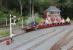 The miniature railway operated by the LMMES is a hidden gem tucked away in the North Lancashire countryside between Carnforth and Milnthorpe. It operates on Sundays (and BH Mondays) between Easter and September but isn't widely advertised. A J94 is signalled into the station platform by the box that controls the whole circuit and adjacent level crossing. <br><br>[Mark Bartlett 20/07/2014]